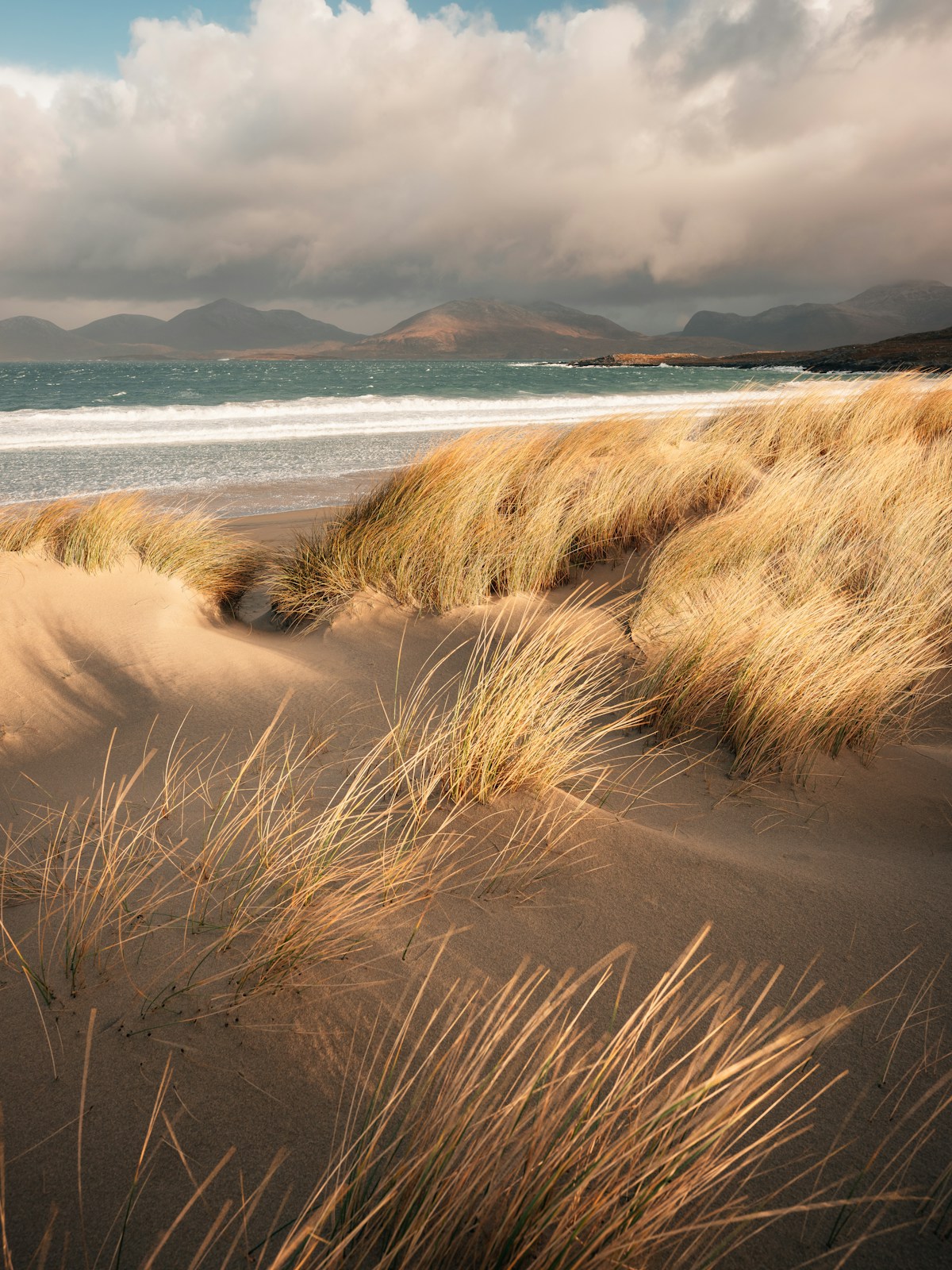 Luskentyre Beach on the Isle of Harris with sand dunes and mountains